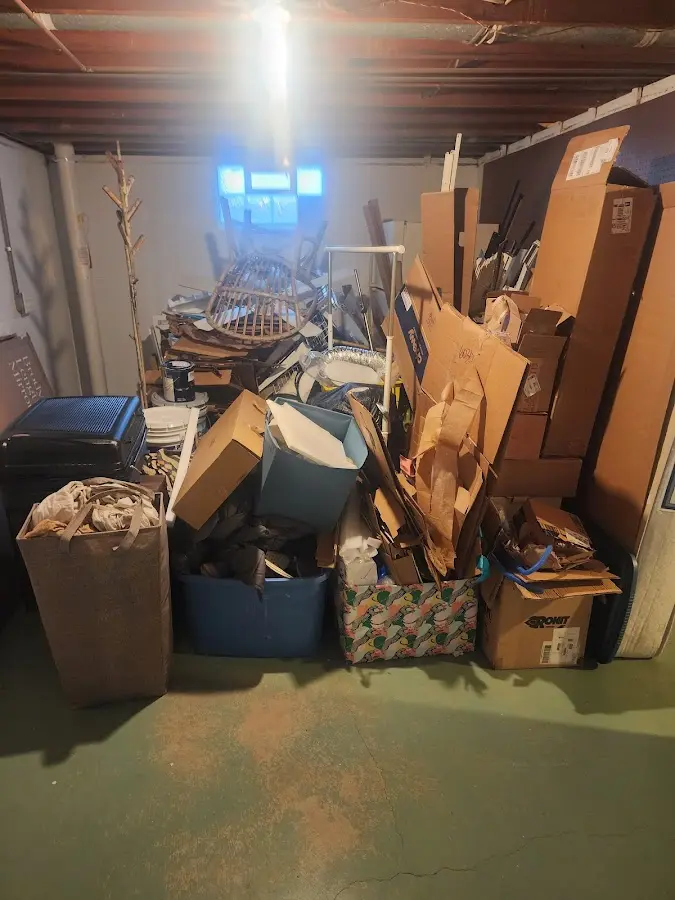 Roll-off dumpster container at job site for 20 Yard Dumpster Rental in University